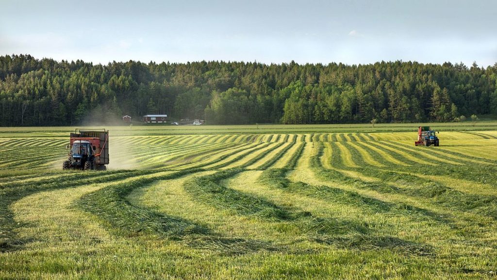 an image of two tractors as part of a farming business